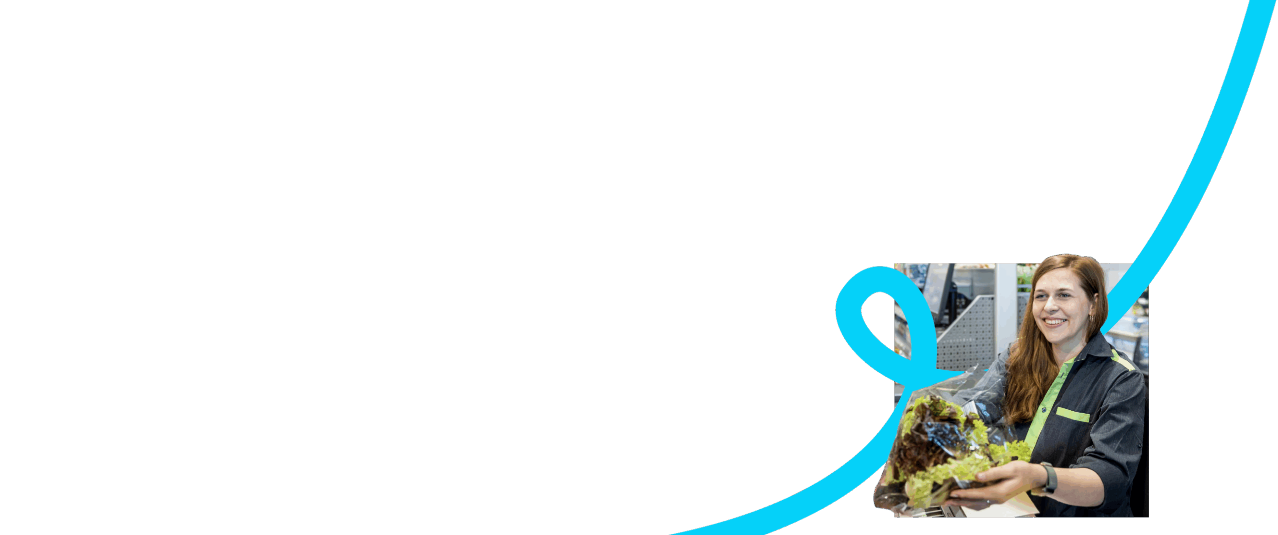 Smiling girl working at a supermarket check-out